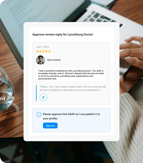 A person clicks "Approve" on a digital review reply form for Lynchburg Doctor displayed on a laptop, enhancing SEO through efficient review management.